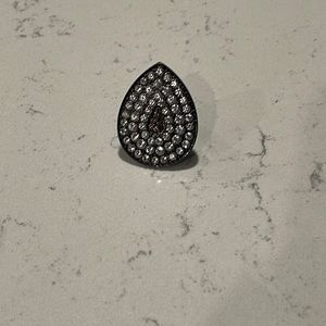 Metallic tear drop ring
